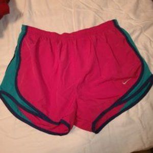 Pink Nike shorts with liner. Size medium.